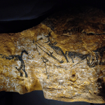 3D laser scanning process preserving the intricate prehistoric art of Lascaux Cave for future virtual reality exploration.