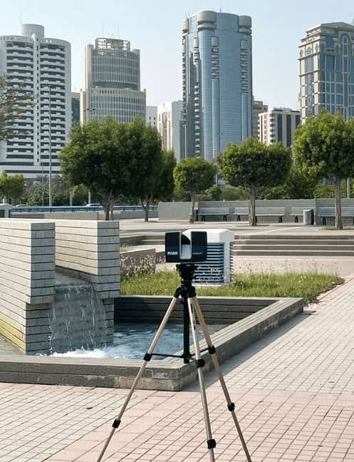 High-resolution laser 3D scanning equipment capturing a building’s structure