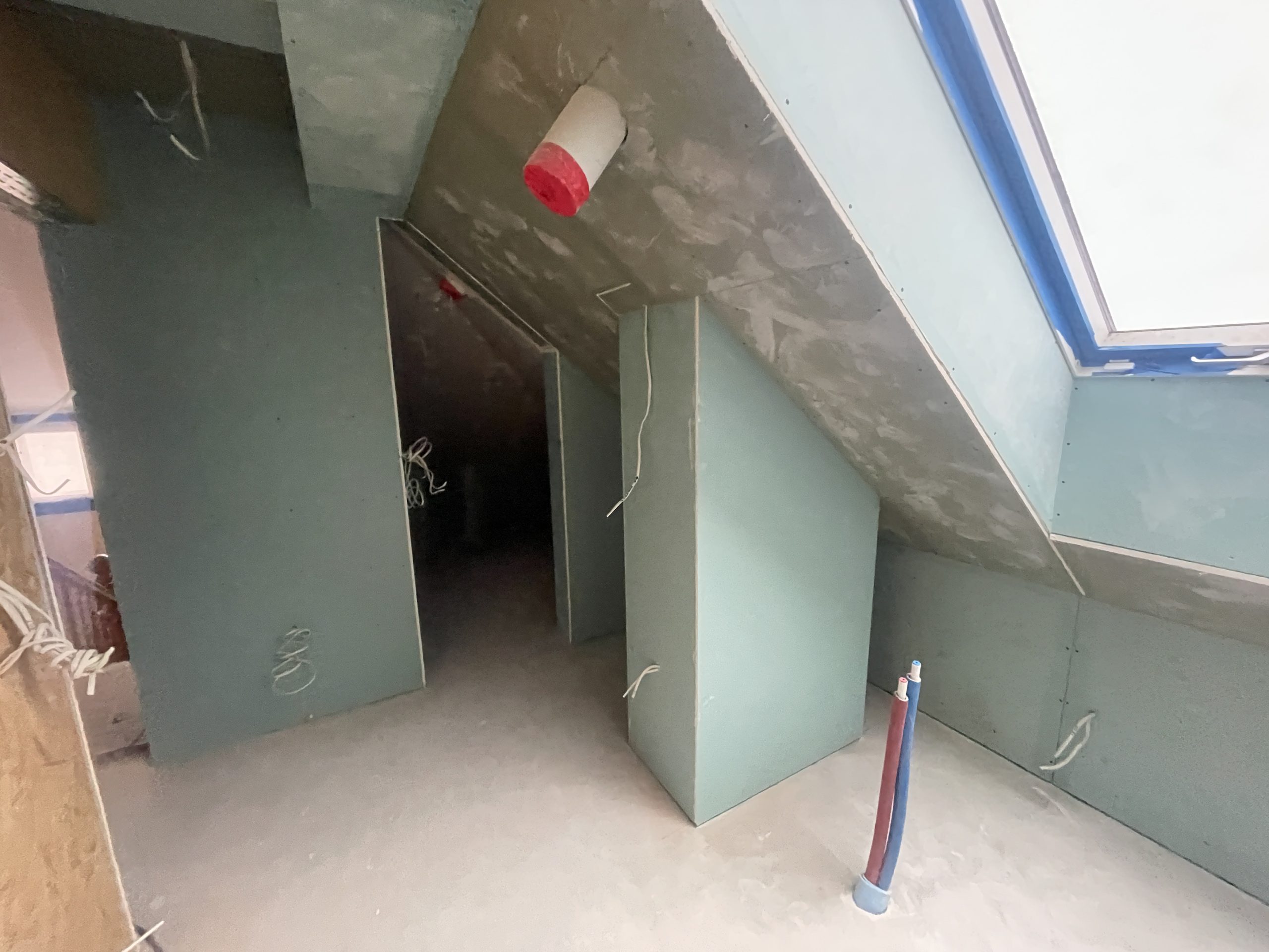 Attic interior prepared for architectural inventory before residential redesign