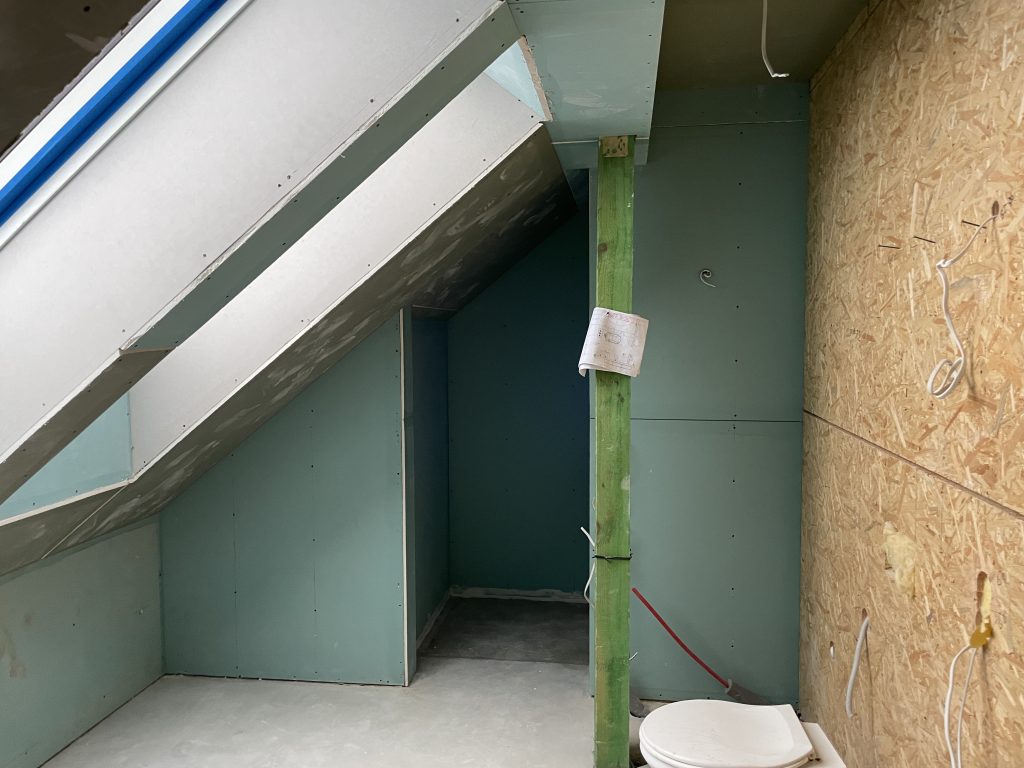 Attic interior space with structural column measured during architectural inventory